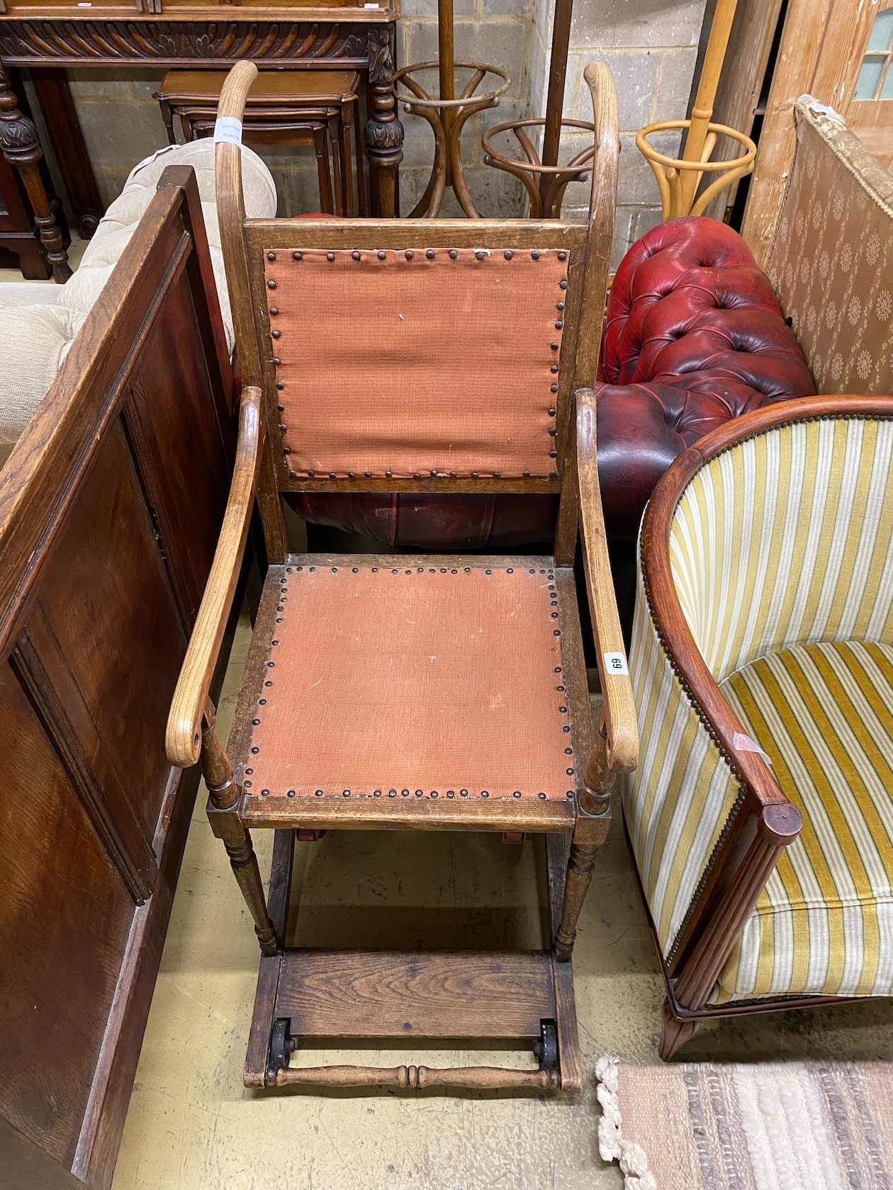 A late 19th century oak invalid’s chair, height 116cm